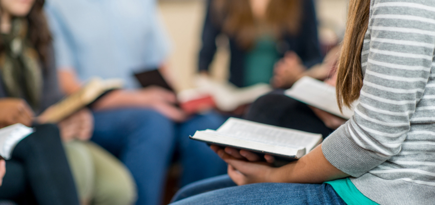 Bible Study A group of high school students studying the Bible together.